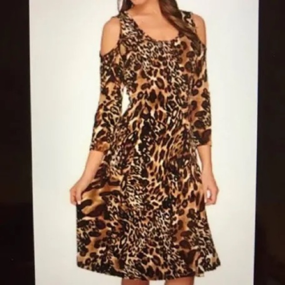 Susan Graver liquid knit animal print mid length cold shoulder dress.  Classic